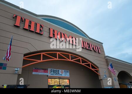 Facade with logo and sign at dusk at Home Depot home improvement store in Pleasanton, California, March 12, 2018. () Stock Photo