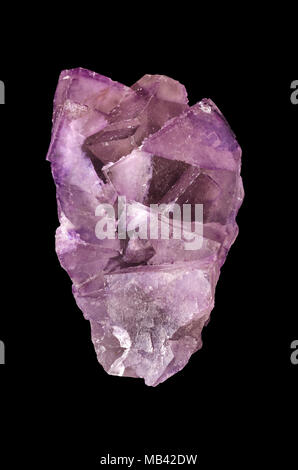 Fluorite crystal cluster from above over black. Fluorspar, a mineral form of calcium fluoride, CaF2. Belongs to halite minerals. Stock Photo