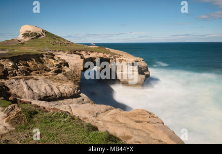 Dramatic Tunnel Beach, Dunedin, New Zealand Stock Photo