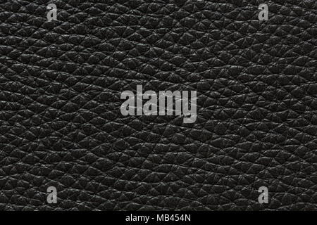 Contrast relief leather texture in saturated grey tone. Stock Photo