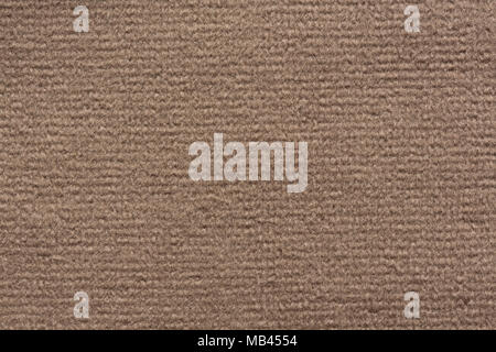 Relief fabric texture in soft brown colour. Stock Photo