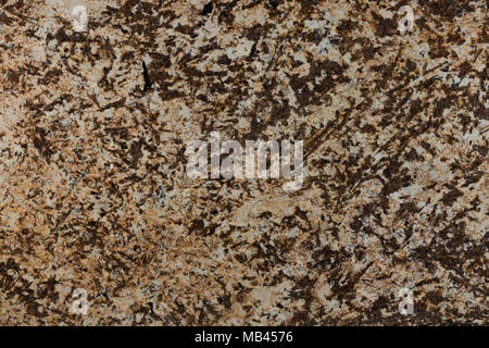 Seamless brown granite texture as background. Stock Photo