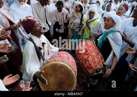 Ethiopian Orthodox worshipers playing the Kebero a double-headed Stock ...