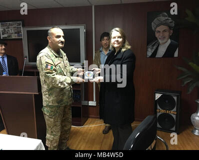 General Command of Police Special Units Commander Maj. Gen. Sayed Mohammed Khan presents a gift to Norwegian Ambassador Mari Skare during an opening ceremony for the Female Foundation Course at the Special Police Training Center, Kabul, Afghanistan, Feb. 17, 2018. Skare was the first Special Representative for Women, Peace and Security to the NATO Secretary General. ( Stock Photo