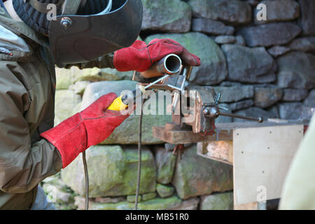 Man welding iron Stock Photo