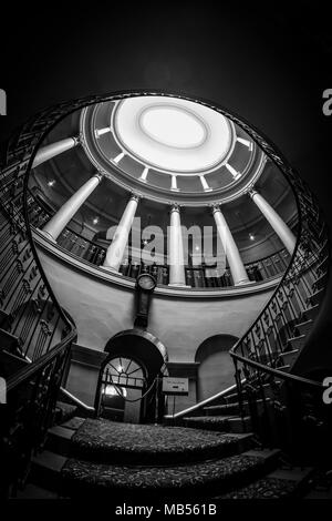 The fantastic curved staircase inside Culzean Castle located near Maybole in Ayrshire Scotland Stock Photo