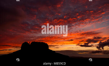 Jubilee Tower with dramatic clouds at sunset on the summit of Moel Famau, North Wales Stock Photo
