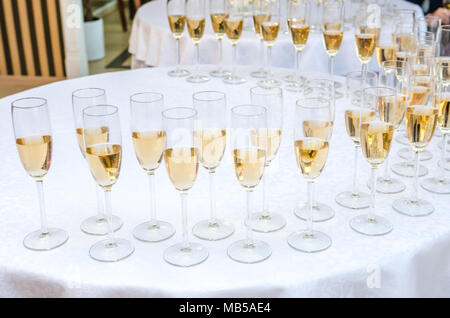 Catering bar for celebration. Beauty of interior for wedding day. Champagne in the glases on the buffet table Stock Photo