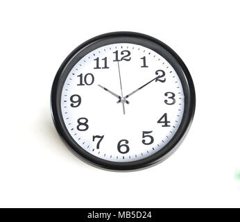 Simple classic black and white round wall clock isolated on white Stock Photo