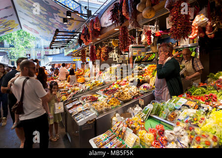 Herbs, spices, fruit and vegetable stalls at La Boqueria Market in Barcelona, Spain Stock Photo