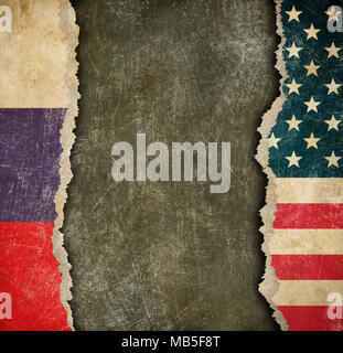 USA and Russian torn paper flags Stock Photo