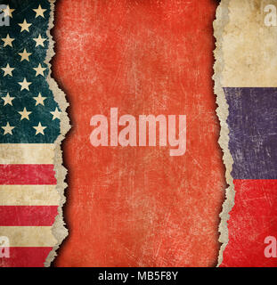 USA and Russian torn paper flags Stock Photo