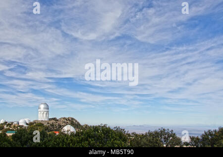 Kitt Peak is an astronomical observatory in the Sonoran Desert of Arizona on the Tohono O'odham Indian Reservation.  It has 23 optical and 2 radio Stock Photo