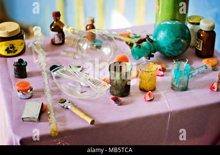 Different dirty beakers and tubes on table. Horizontal color photography. Stock Photo