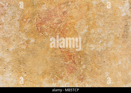 Weathered yellow limestone wall background in Malta, closeup view Stock Photo