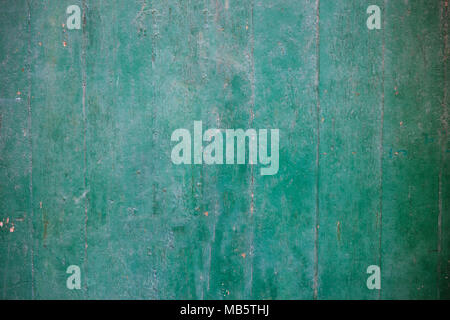 Weathered green painted wooden background, paint partially faded Stock Photo