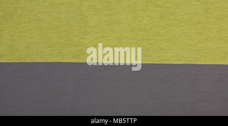 decorative plaster is colored, yellow and gray decorative plaster. Stock Photo