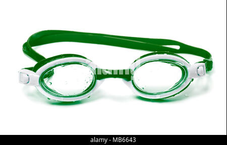 Wet green goggles for swimming. Isolated on white background. Stock Photo