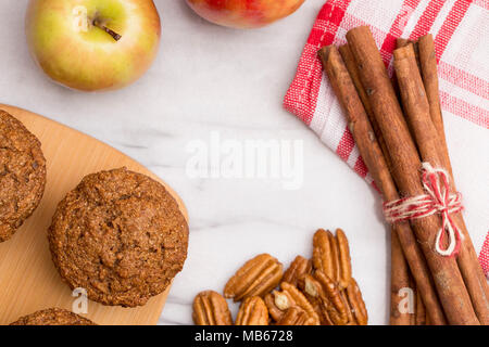 Apple Cinnamon Pecan Muffins on a Marble Table Stock Photo