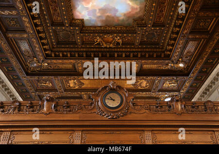 The impressive ceiling and clock in The Rose Main Reading Room in the New York Public Library, New York City, USA. Stock Photo