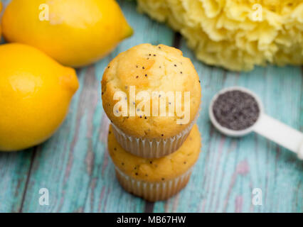 Lemon Poppyseed Muffins on a Blue Wooden Table Stock Photo
