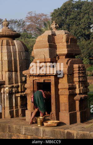 Temple Poojari doing Pooja in Mukteshvara Temple Odisha India Ancient 10th Century Hindu Temple Stock Photo