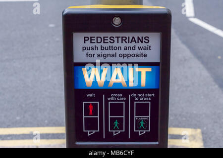 Wait Cross Sign Illuminated wait sign at pedestrian crossing, London Stock Photo - Alamy