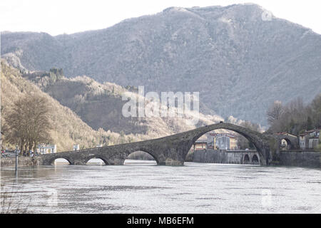 Filtered to add value to soft evening light. Few unidentiifiable people.Devil's aka Maddalena's Bridge detail, Bagni di Lucca, Garfagnana, Italy. Stock Photo