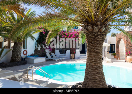 private pool and sun loungers in the sun Stock Photo