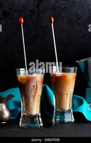 cold brew coffee on the table. coffee pot in the background Stock Photo