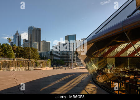 Sydney CBD and the Bennelong Restaurant inside the Sydney Opera House Stock Photo