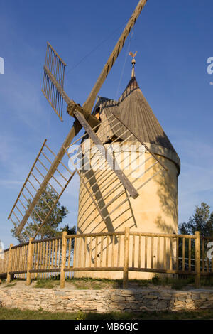 An old and historic wind mill used in past century in Provence region, France. Where french writer Alphonse Daudet wrote « Les lettres de mon moulin » Stock Photo