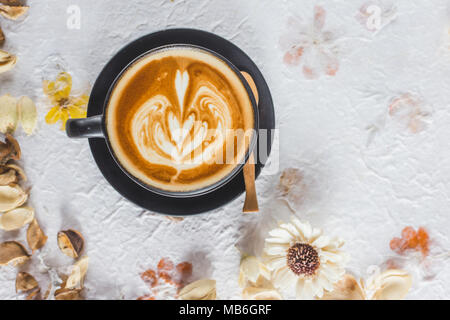 Lavender coffee cup. Latte art in cappuccino coffee cup at cafe table Stock  Photo - Alamy