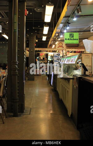 Walkway in lower level of train station Stock Photo - Alamy