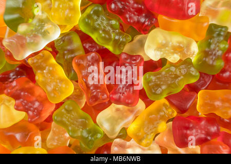 Colourful jelly babies / gummy bear candy sweets. Potential use as a background. Stock Photo