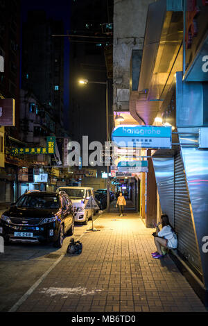 Streets of Hong Kong in Kowloon, at night Stock Photo - Alamy