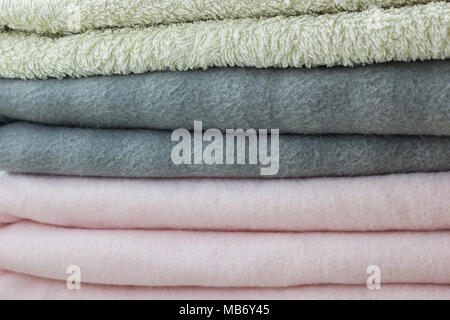 Pink and gray plaid with folded towel close-up Stock Photo