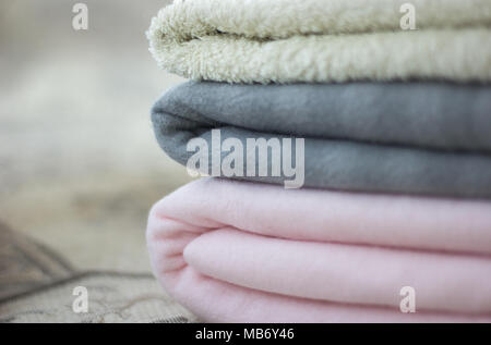 Pink and gray plaid with folded towel close-up Stock Photo