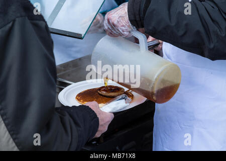 Elmira, Ontario Canada. 07 April 2018. Elmira Maple Syrup Festival 2018, World's largest single day syrup festival. Serving pancakes with maple syrup. Performance Image/Alamy Live News Stock Photo