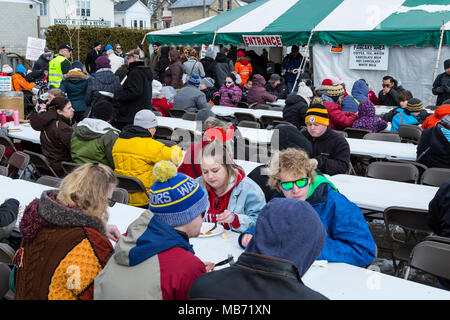 Elmira, Ontario Canada. 07 April 2018. Elmira Maple Syrup Festival 2018, World's largest single day syrup festival. Enjoying pancake breakfast with fresh maple syrup. Performance Image/Alamy Live News Stock Photo