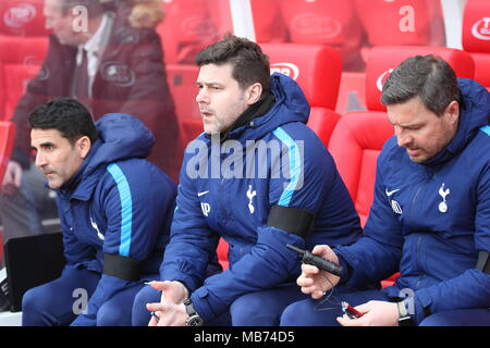 Stoke, UK. 7th April 2018. Stoke, Staffordshire, UK. 7th April, 2018. Tottenham Hotspur players warm up ahead of their 2-1 win over Stoke City at the Bet 365 Stadium. Tottenham Hotspur Manager Mauricio Pochettino arrives in the dugout. Credit: Simon Newbury/Alamy Live News Stock Photo