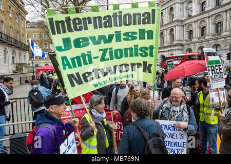 London, UK. 7th April, 2018. Activists from the International Jewish Anti-Zionist Network join hundreds of people at a rally outside Downing Street in solidarity with Palestinians attending the Great March of Return in Gaza and in protest against the killing there by Israeli snipers using live ammunition of at least 27 unarmed Palestinians and the injury of hundreds more. Credit: Mark Kerrison/Alamy Live News Stock Photo