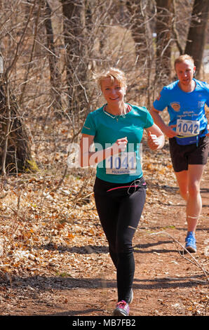 Runners in an amateur road and cross country running race, New Forest ...