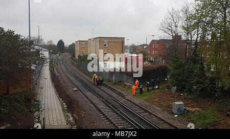 Tooting, South London, UK. 8th April, 2018. Body taken off railway line, Tooting, South London Credit: London Snapper/Alamy Live News Stock Photo