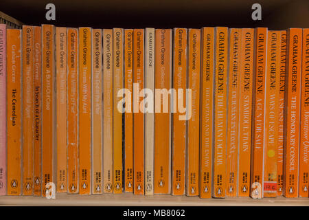 A collection of Graham Greene books in a home library Stock Photo