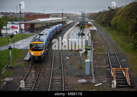 A First Transpennine express class 185 train departing from Barrow