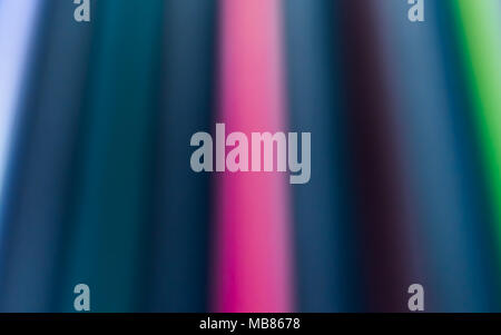 vertical blurred colored lines divided by color red Stock Photo