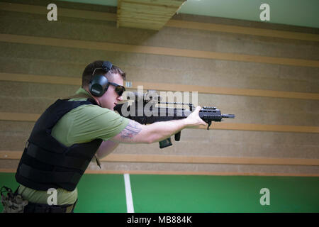 A U.S. member of the Supreme Allied Commander Europe (SACEUR) Security Detachment practices shooting with the Heckler and Koch G36K A4 rifle, on Chièvres Air Base, Belgium, Jan. 24, 2018. (U.S. Army Stock Photo