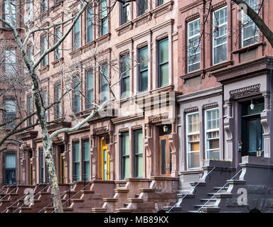 Block of Brownstone buildings in the Upper West Side neighborhood of Manhattan in New York City Stock Photo