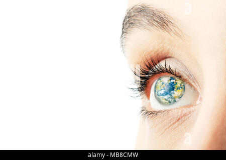 Close up of woman's eyes with image of planet earth superimposed Stock Photo